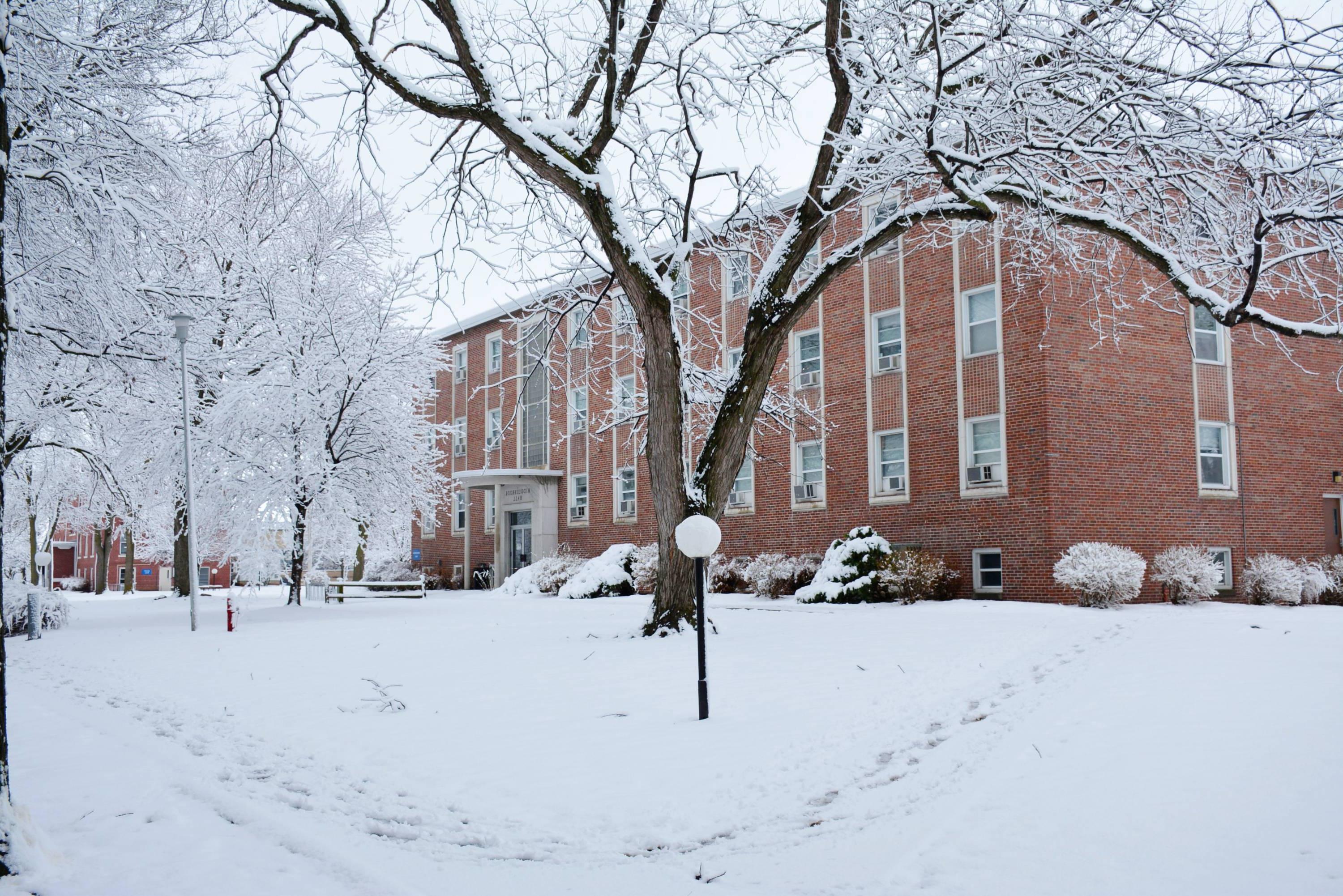 snow covered brick building